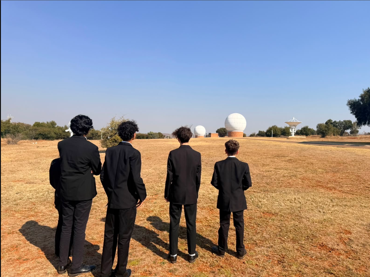 Surveying the SANSA radome field during a ground-segment study visit.