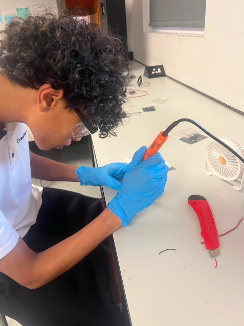 Trimming a structural panel for the TubeSat chassis