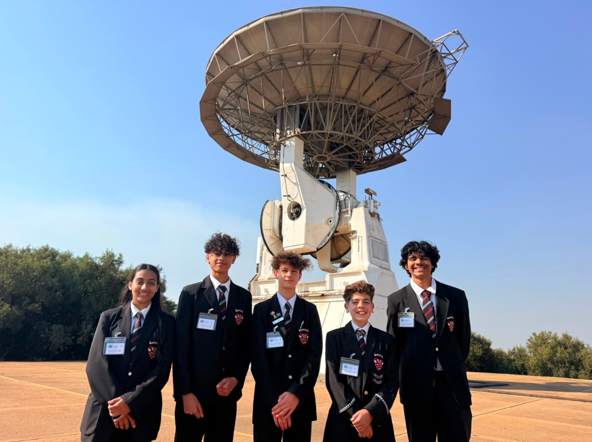 The EAK-Orbitals management team at the SANSA deep-space antenna.